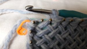 Last stitch before corner A