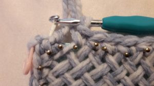 Crocheted around 22 nails